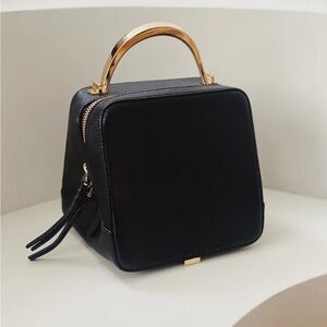 The Volan Mini Leather Handle Bag